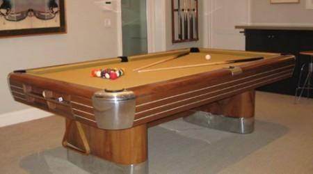 An antique Brunswick Anniversary pool table that has been fully restored by Billiard Restoration Service