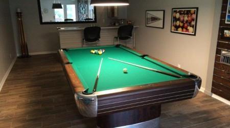 Restored Anniversary billiards table in pool room