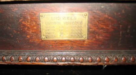 Closeup of billiard table patent plate