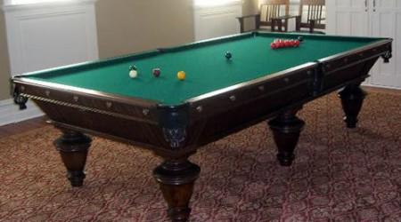 Fully restored International, an antique billiards table