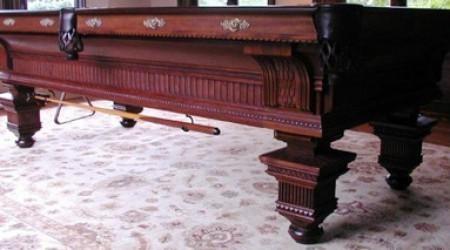 The Jewel, antique pool table with intricate carvings