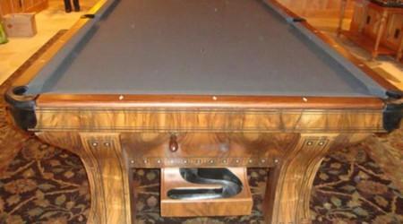 Restored antique Marquette billiards table