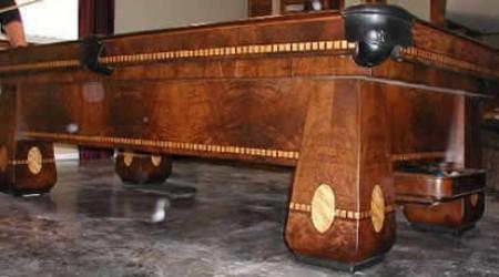 A restored Brunswick Medalist antique billiard table