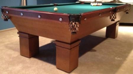 Restored antique Brunswick Mikado pool table