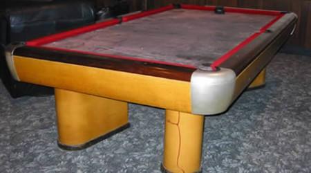 A restored Moderne, antique pool table by Brunswick