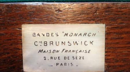 Brunswick's Bandes Monarch antique billiard table