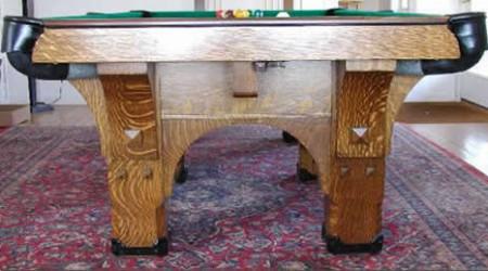 Restored St. Bernard Mission, an antique billiards table