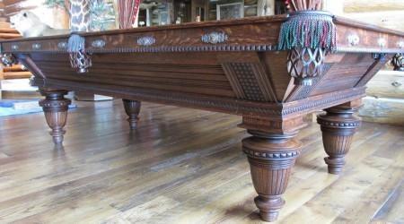 Corner view of restored antique Improved Union League billiards table