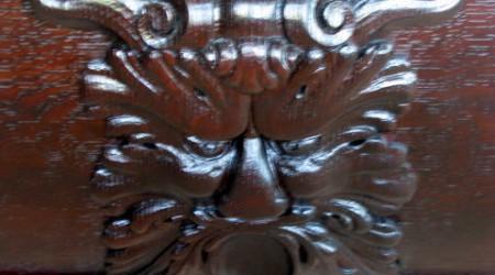 Closeup of W.H. Griffith pool table carving