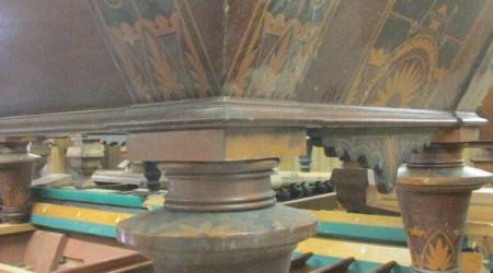 Leg of W.H. Griffith Inlaid billiards table before restoration