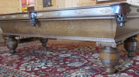 Antique Cambridge billiards table with amazingly detailed carvings