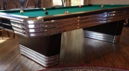 Restored Centennial billiards table in dark mahogany