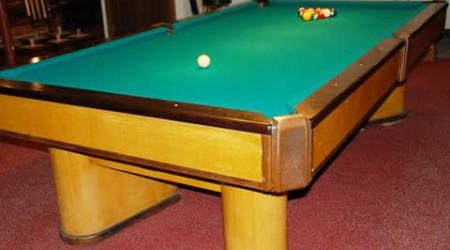 The Commander, a restored antique pool table