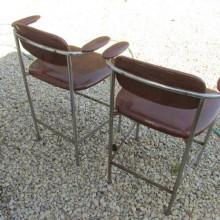 Back view of mid-century billiard chairs