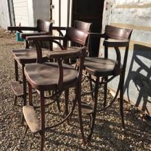 Side view of 4 antique Bentwood Billiard Chairs
