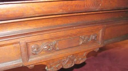 Ornate carvings on a  The G. Lambrechts billiard table