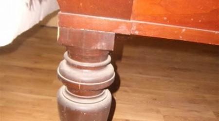 J.E. Came Harvest antique pool table leg before being restored