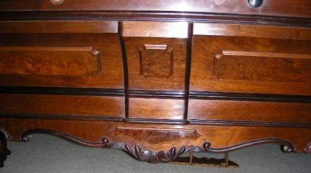 Side rail of stored Jacob Strahle Standard antique table