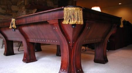 Marquette, restored antique Brunswick pool table