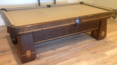 Felt and side view of restored antique The Medalist billiard table