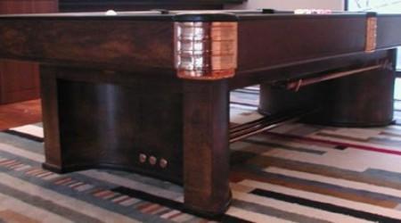 Restored Paramount billiards table in deep, rich wood