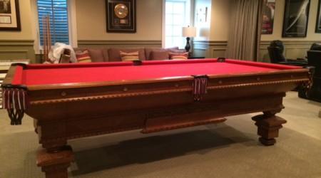 Restored antique Pride of Cleveland pool table
