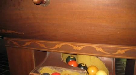Before restoration, a custom Sultana billiards table