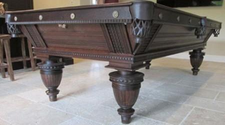 Detailed restoration of antique billiards table The Improved Union League
