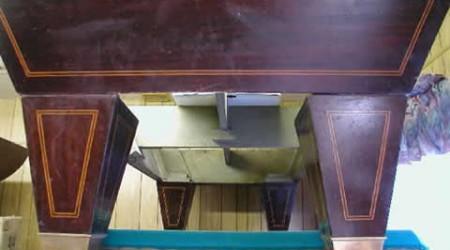 Prior to restoration, a YMCA Special antique pool table