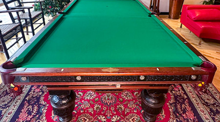 The top of the Benedict Embossed antique billiard table